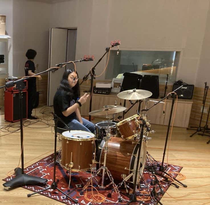 Emily on the drums